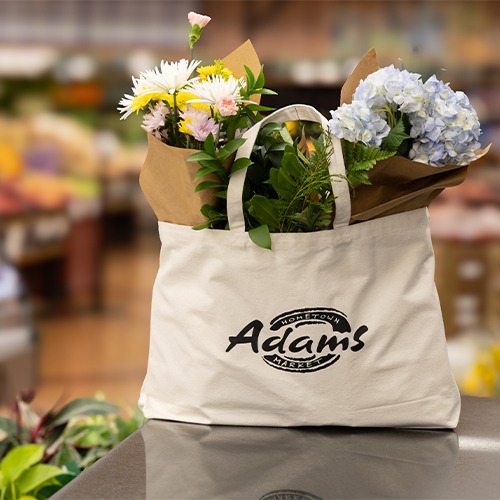 Adams Hometown Market Logo on Bag with Flowers - Vendor & Production Management
